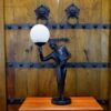 ART DECO LAMP MAN HOLDING LIGHT BLACK